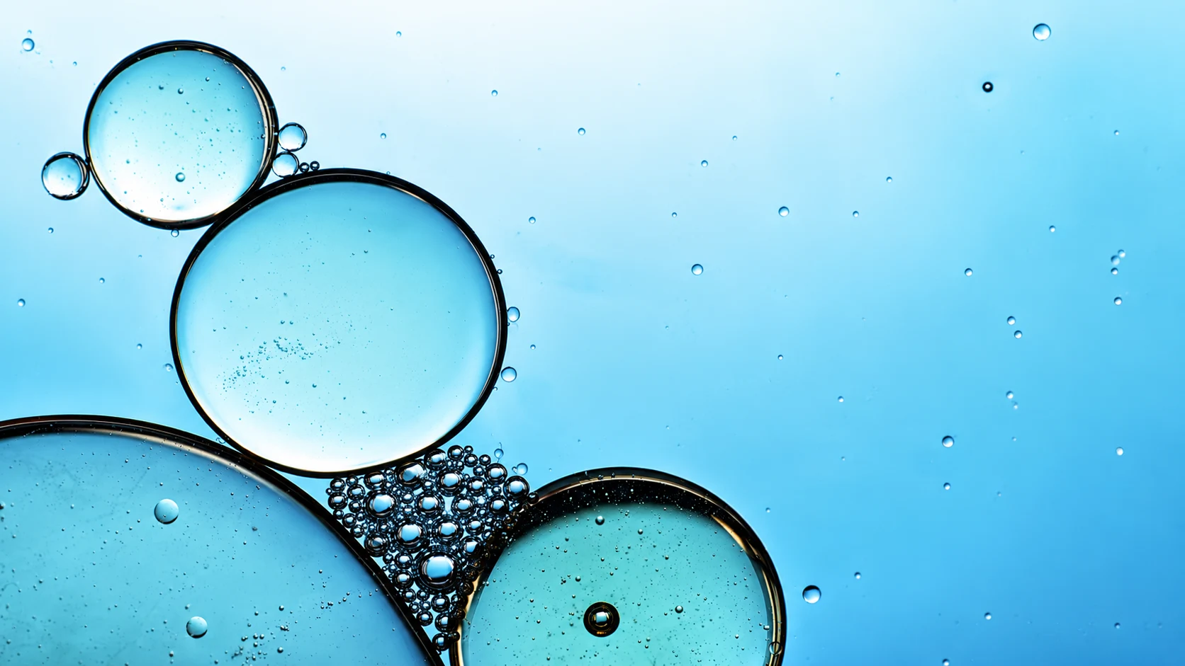 Abstract bubbles and fluid interfaces in blue water